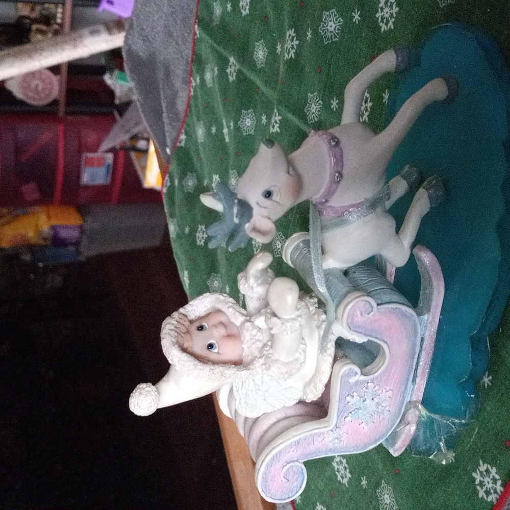 Little girlie sleigh with reindeer.
